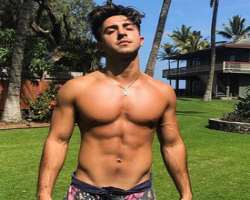 He is a fitness freak and has maintained his six-pack abs which is very necessary for a career in modeling.